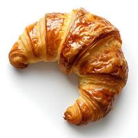 croissant geïsoleerd Aan wit achtergrond met schaduw. Frans gebakje croissant. bladerdeeg gebakje toetje foto