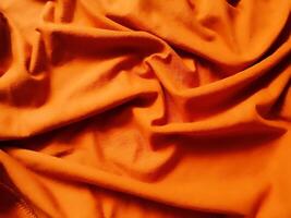 oranje kleding stof achtergrond, zijdezacht helling luxe kleding stof textuur, zomer textiel banier materiaal tropisch Golf kijken mode abstract ontwerp poster sjabloon foto