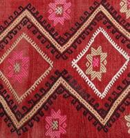 Turks kilim met natuurlijk kleuren in traditioneel patronen foto