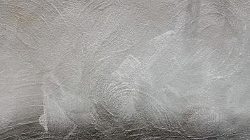 elegante abstracte grijze achtergrond. vintage patroon met artistieke decoratieve pleister voor design. grijze grunge textuur. achtergrond behang. oud cement. foto