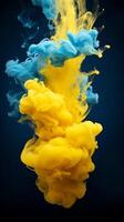blauw en geel acryl kleuren en inkt in water. abstract achtergrond. foto