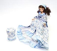 verzameling pop in een blauw jurk foto