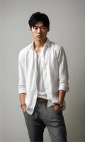 jong Aziatisch Mens vervelend een wit linnen shirt.generatief ai. foto