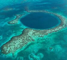 Belize cayes - klein tropisch eiland Bij barrière rif met paradijs strand - bekend voor duiken, snorkelen en ontspannende vakanties - caraïben zee, belize, centraal Amerika foto