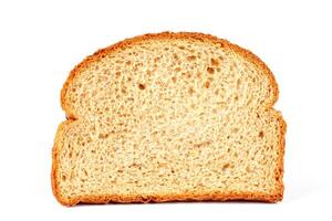 geheel tarwe brood met gesneden granen en zaden geïsoleerd Aan wit achtergrond foto