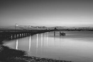 zonsondergang Aan st kilda pier in melbourne, Australië. foto