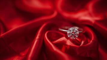 een diamant ring in focus Aan een rood zijde of kleding stof achtergrond. valentijnsdag dag foto