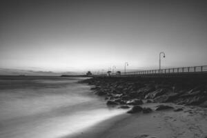 zonsondergang Aan st kilda pier in melbourne, Australië. foto