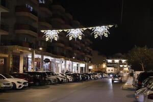 Kerstmis tijd, albox Bij nacht foto