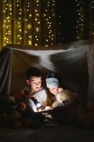 weinig kinderen lezing bedtijd verhaal Bij huis foto