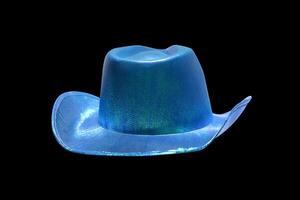 levendig blauw cowboy hoed Aan zwart achtergrond foto