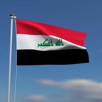 Irak vlag is golvend in voorkant van een blauw lucht met wazig wolken in de achtergrond foto