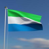 Sierra Leone vlag is golvend in voorkant van een blauw lucht met wazig wolken in de achtergrond foto