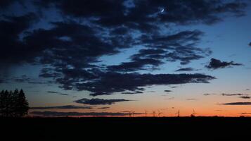 donker blauw zonsondergang met wind generatoren foto