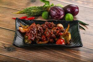 Aziatisch keuken - varkensvlees met Chili saus foto