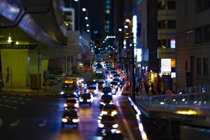 een nacht miniatuur neon straat in Shibuya tokyo focus verleggen foto