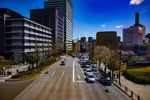 een kers straat Bij yasukuni Laan in tokyo breed schot foto