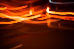 licht oranje spoor vervagen zomer abstracte lichten bij beweging wervelspoor effect zwart foto