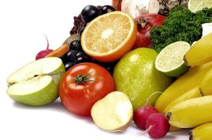 sinaasappel, appel en veel fruit creatieve achtergrond tropisch vers fruit kleurrijk gezond foto