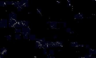 de witte deeltjes op een zwarte achtergrond die een sneeuwval vertegenwoordigen. sneeuw overlay beelden voor het geven van een ijskoud of winter effect aan de videopresentatie. foto