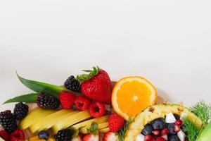 voedselachtergrond, fruit- en groenteachtergrond met kopieerruimte voor tekst, verse voedselingrediënten om te koken, bovenaanzicht met kopieerruimte, voedselreclamebanner foto