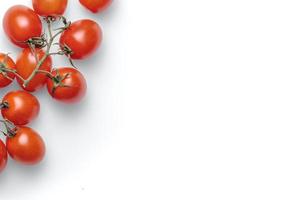 tomatenachtergrond, voedselachtergrond, fruit- en groenteachtergrond met kopieerruimte voor tekst, verse voedselingrediënten om te koken, bovenaanzicht met kopieerruimte, reclamebanner voor voedsel foto