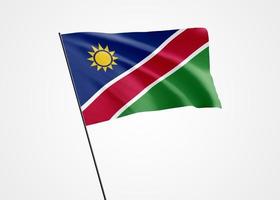 de vlag van Namibië vliegt hoog op de witte geïsoleerde achtergrond. 21 maart namibië onafhankelijkheidsdag. wereld nationale vlag collectie wereld nationale vlag collectie foto