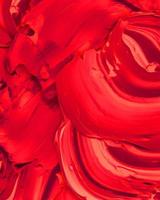 achtergrondontwerp van geschilderde acrylolieverf vloeistof vloeibare kleur rood met creativiteit en moderne kunstwerken