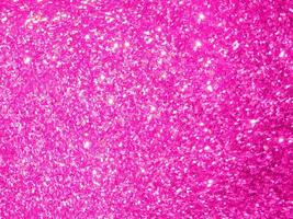 roze glitter abstracte ruwe cement vloer textuur voor onscherpe achtergrond kerstmis foto