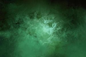 groene nevel ruimte achtergrond en ster veld in de ruimte een nevel veelkleurige poeder explosie op zwart foto