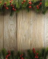 Kerstmisspar op houtstructuur. achtergrond oude panelen foto