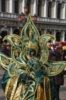 Venetië, Italië 2013 - persoon met Venetiaans carnavalsmasker foto