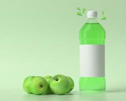 een fles die wordt gebruikt voor het bevatten van appelsap met appel foto