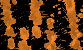 verbrande oranje inktspatten. grunge-spetters. abstracte achtergrond. foto