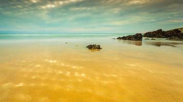 eerste strand cornwall zonsondergang foto