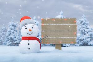 billboard in een besneeuwd landschap met een sneeuwpop foto