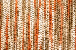 textuur van natuurlijke rieten stof, milieuvriendelijk materiaal voor de vervaardiging van kleding en accessoires. foto