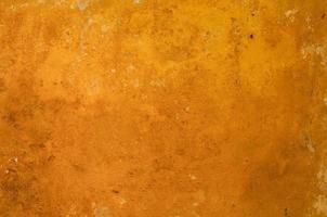 oranje en koperkleurige ondergrond in de vorm van oud en verroest metaal foto