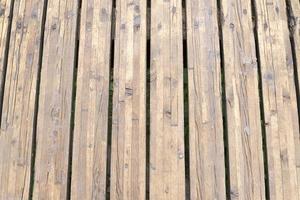 de textuur van bruine stukken hout verticaal. foto