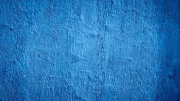 blauwe abstracte gepleisterde cement betonnen muur textuur achtergrond foto