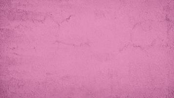 abstracte cement betonnen muur textuur achtergrond met roze kleur foto