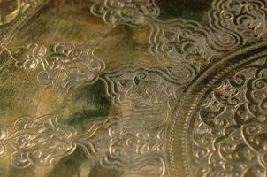 oostelijke gravure op brons, close-up foto