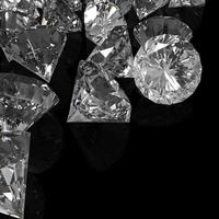 diamanten geïsoleerd op zwart oppervlak foto