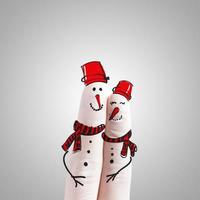 een mooi paar met de hand getekend en vinger, sneeuwpoppen foto