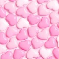 fijne Valentijnsdag. roze achtergrond met realistische harten. foto