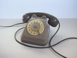 vintage telefoon met draaischijf foto