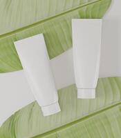 een mock up van paar realistische witte lege cosmetische buis geïsoleerd op een witte achtergrond met bladeren, 3D-rendering, 3D-illustratie foto