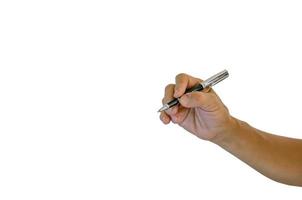 hand met een pen die op een witte achtergrond schrijft foto