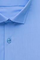overhemd, gedetailleerde close-up kraag en knoop, bovenaanzicht foto