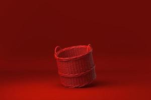 rode rieten mand drijvend op rode achtergrond. minimaal concept idee creatief. monochroom. 3D render. foto